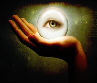 digital art image of hand holding orb with eye inside 