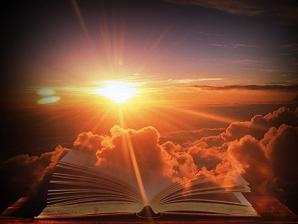 sunrise light burst holy bible prophetic book in clouds