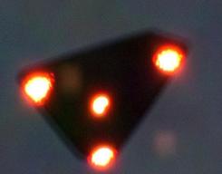Black triangle ufo craft with lights in sky
